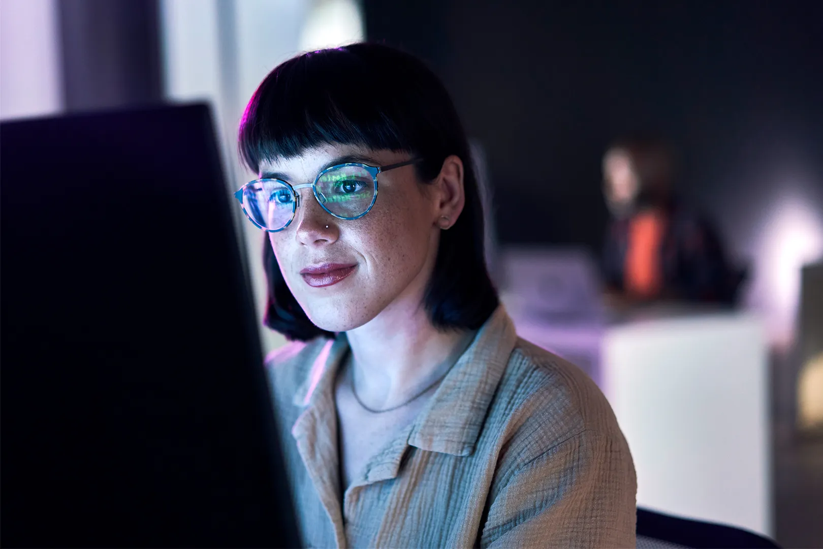 A woman working at a computer