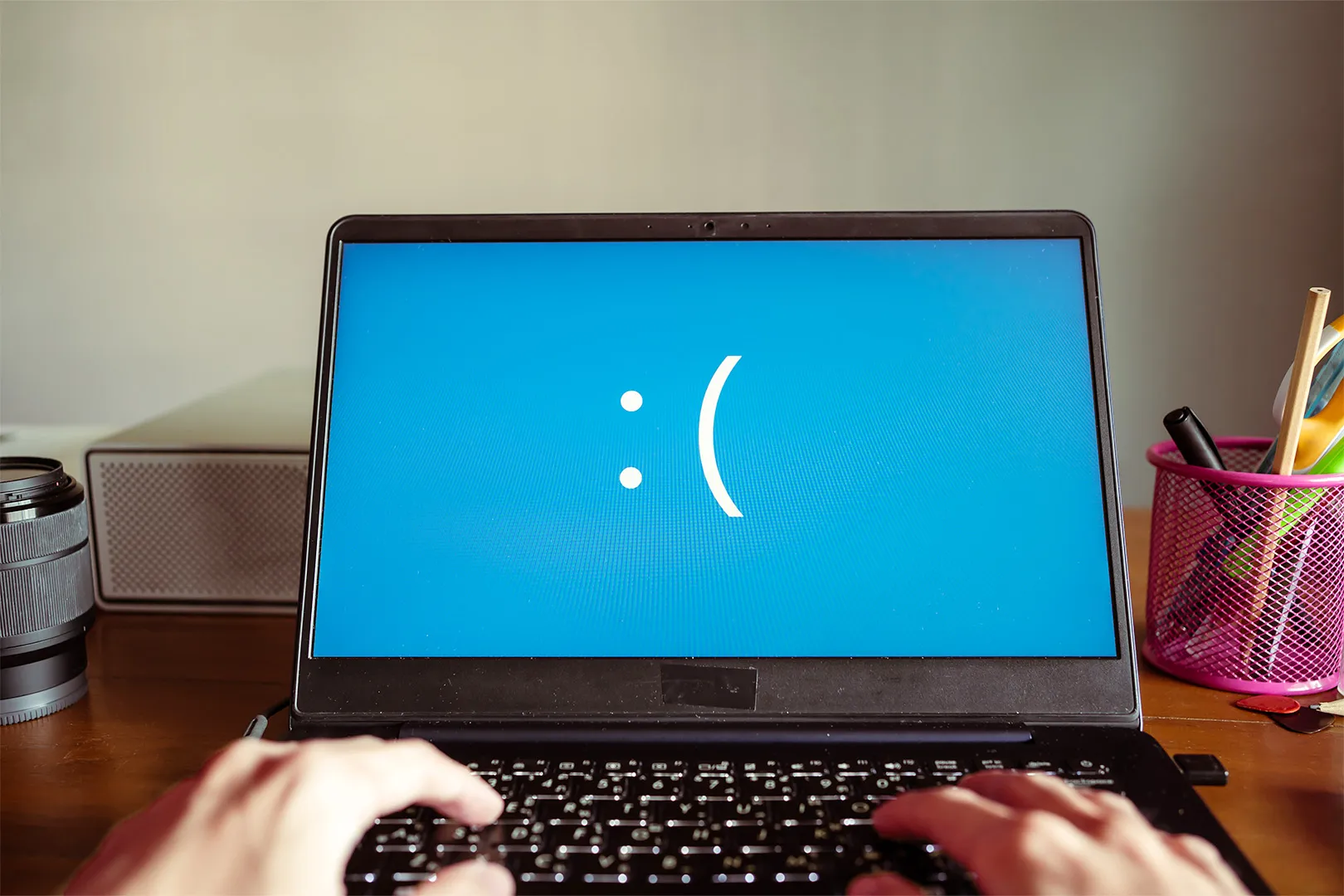 A laptop with a blue screen error