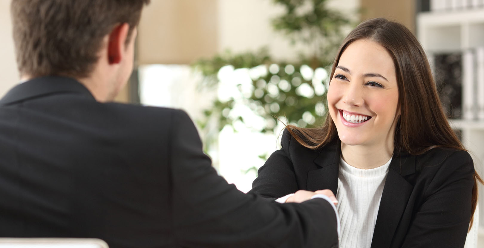 a smiling female young professional