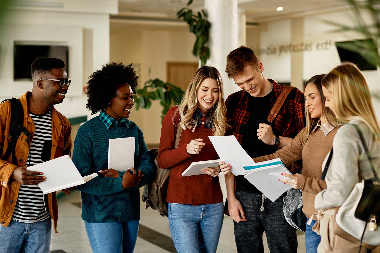 Happy Students discussing chapters